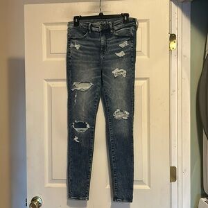 American Eagle High Rise Jegging Size 8 Distressed